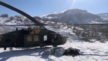 Köylere yardımı askeri helikopterler götürüyor 